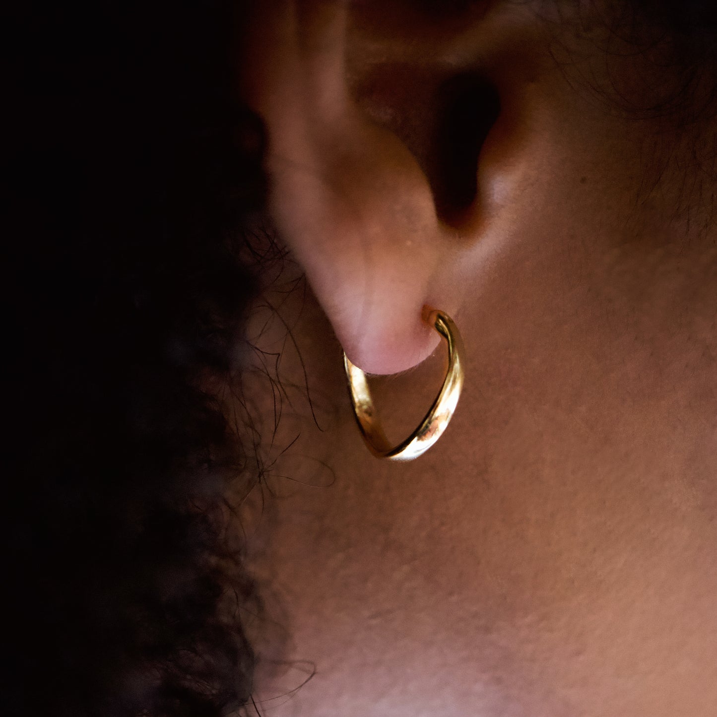 Gold Curved Hoop Earrings Abu Dhabi UAE